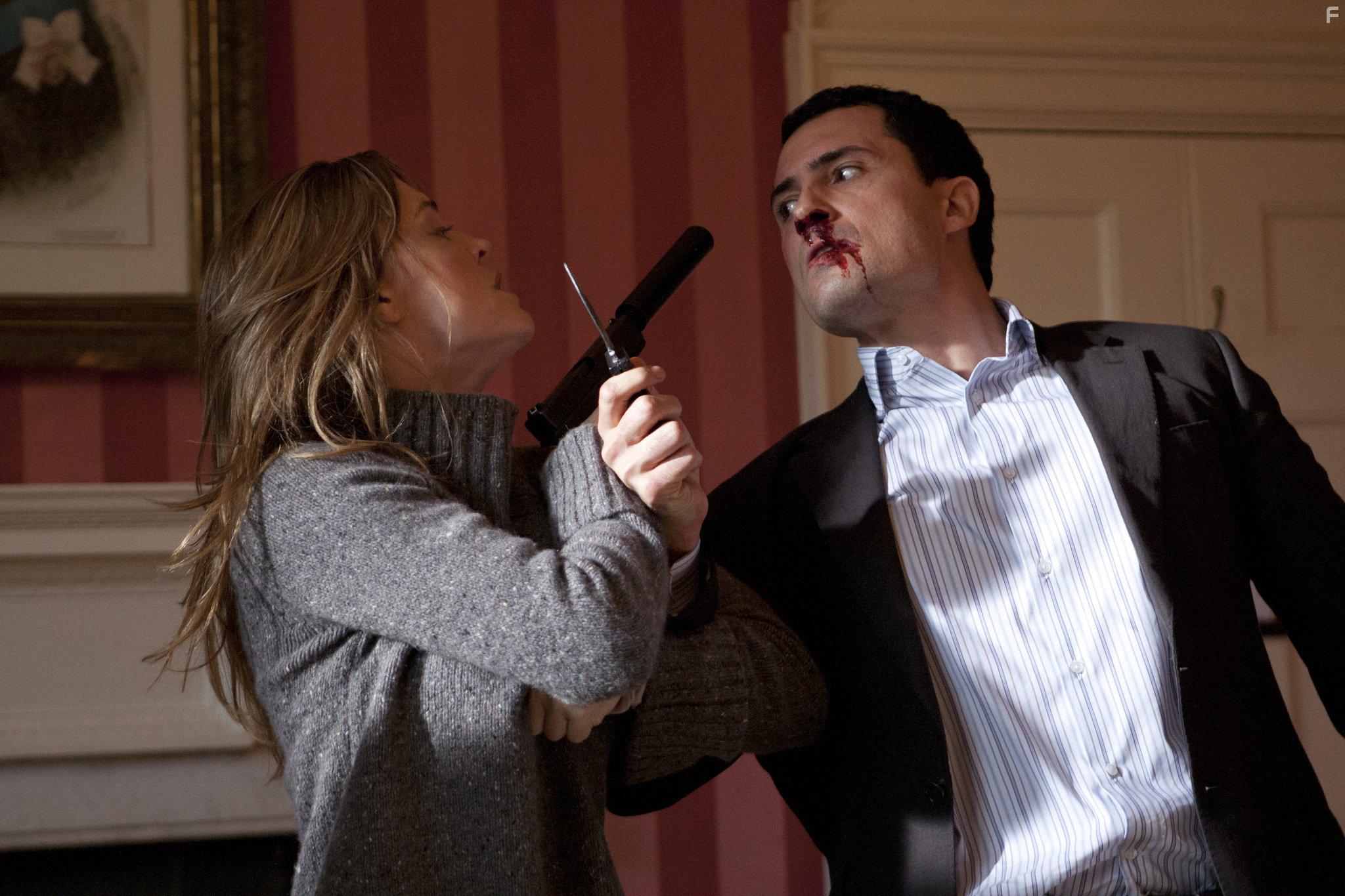 Melissa George and Dhafer L'Abidine in Hunted (2012)