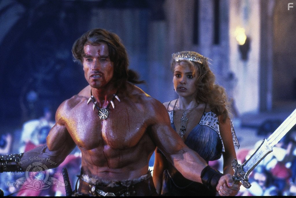 Arnold Schwarzenegger and Olivia d'Abo in Конан-разрушитель (1984)