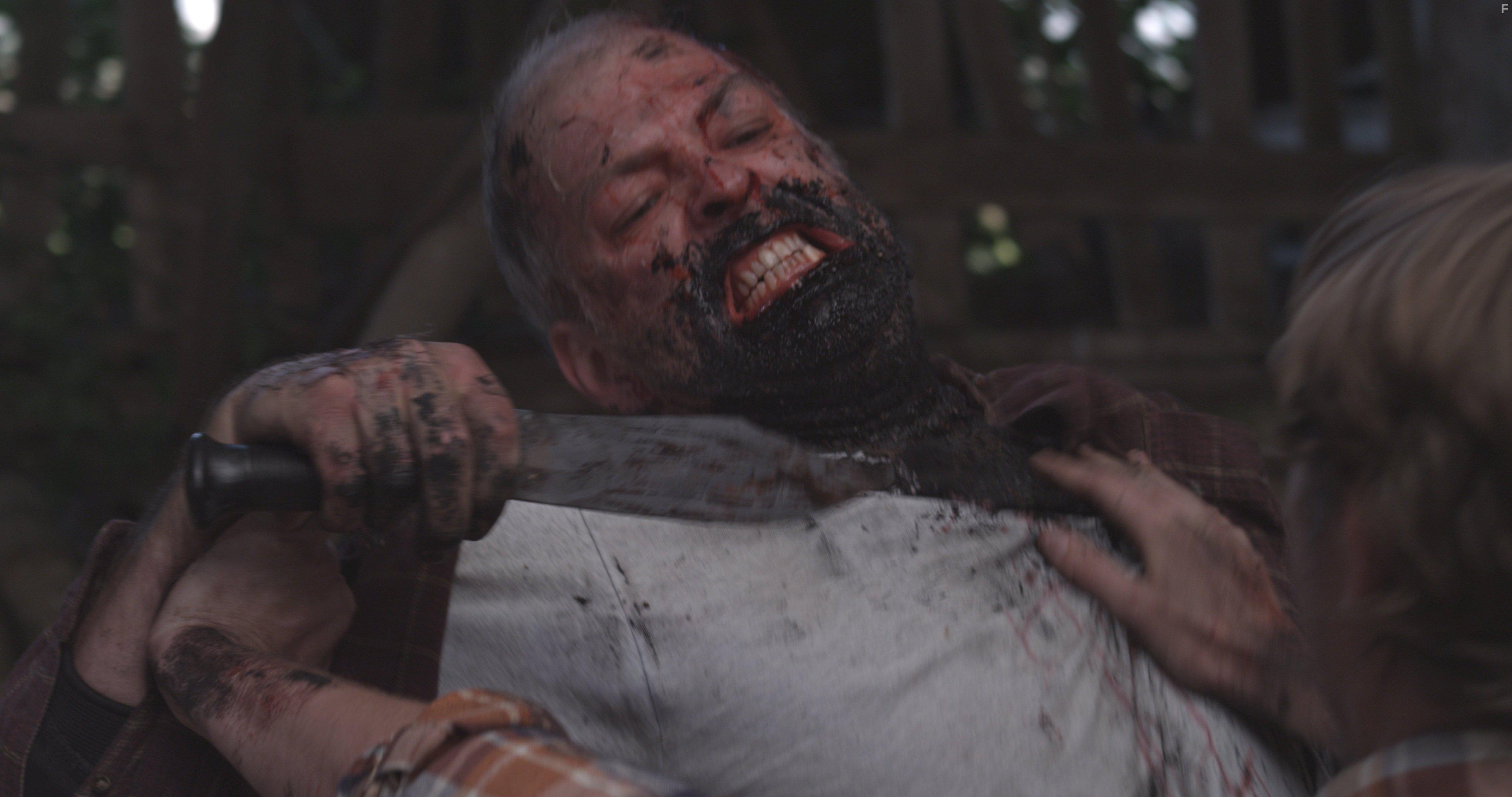 Jesse James and Richard Carmen in The Hollow One (2015)