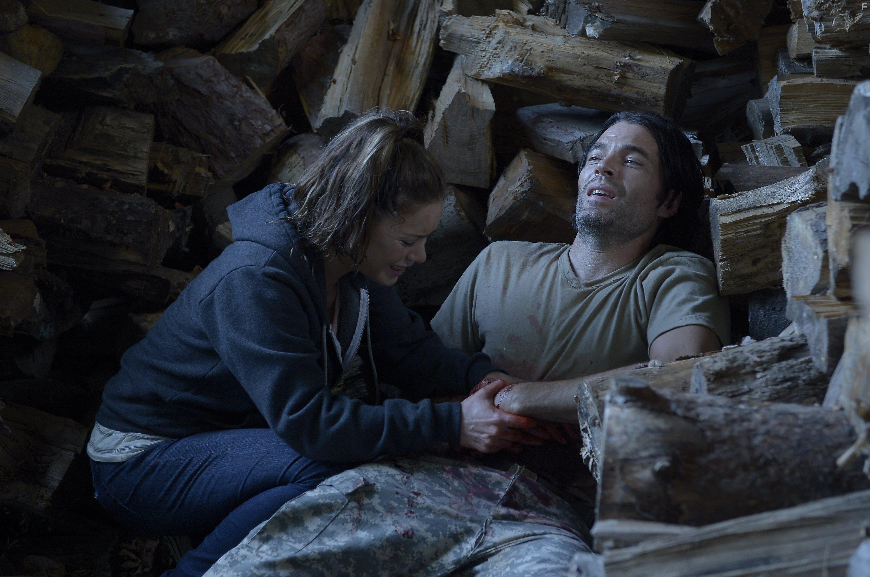 Tim Rozon and Roxanne McKee in Crossfire (2016)