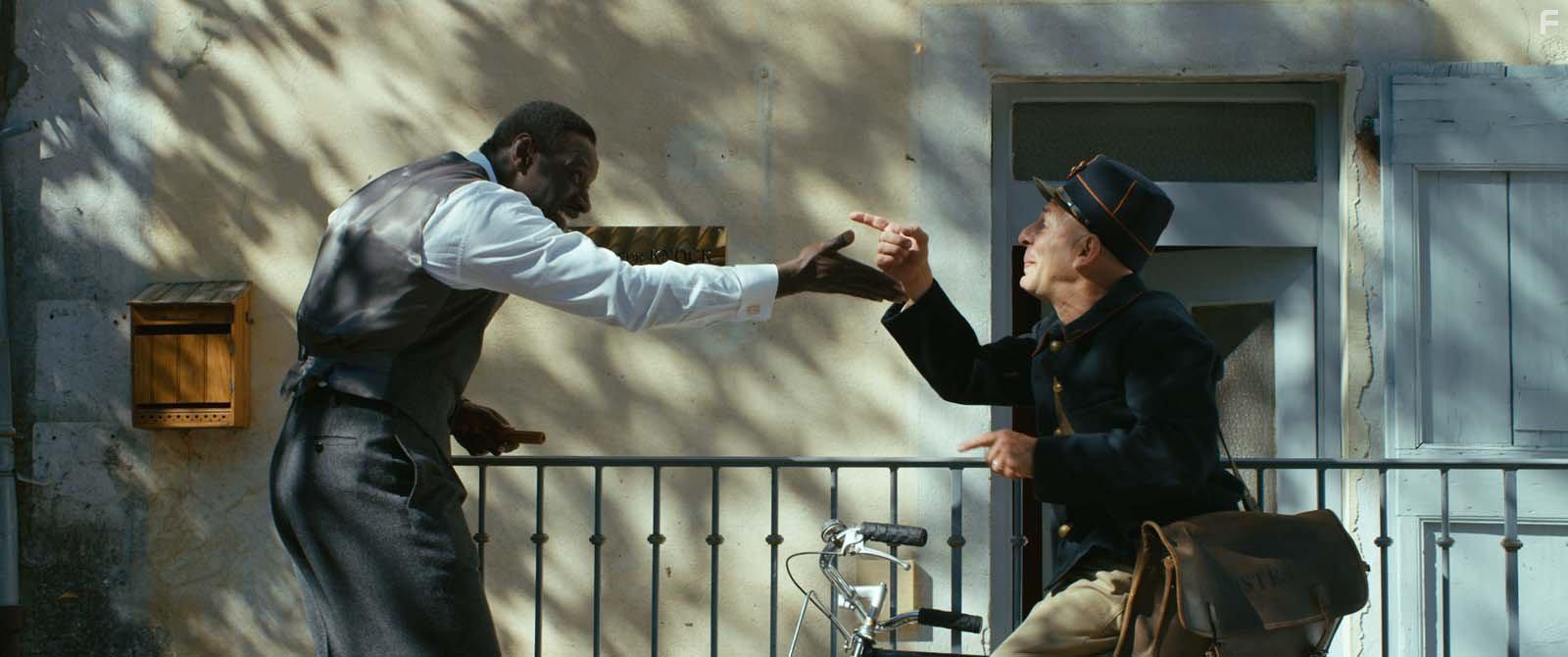 Christian Hecq and Omar Sy in Knock (2017)