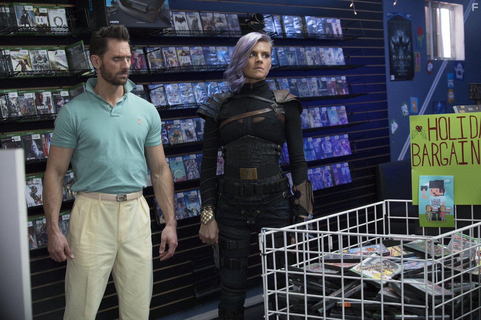 Eliza Coupe and Derek Wilson in Future Man (2017)