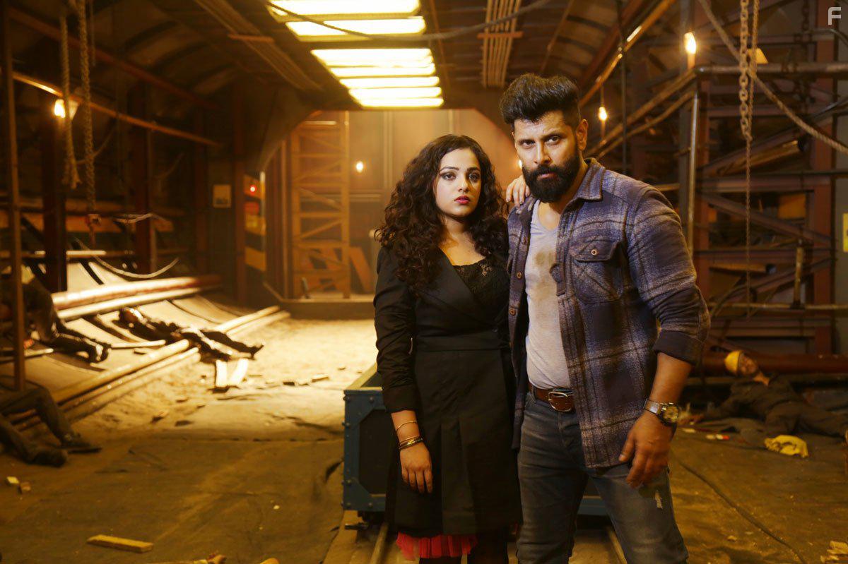 Vikram and Nithya Menon in Iru Mugan (2016)