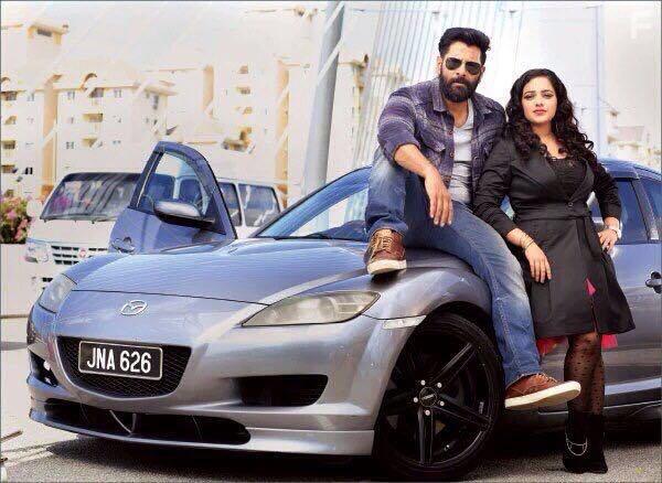 Vikram and Nithya Menon in Iru Mugan (2016)