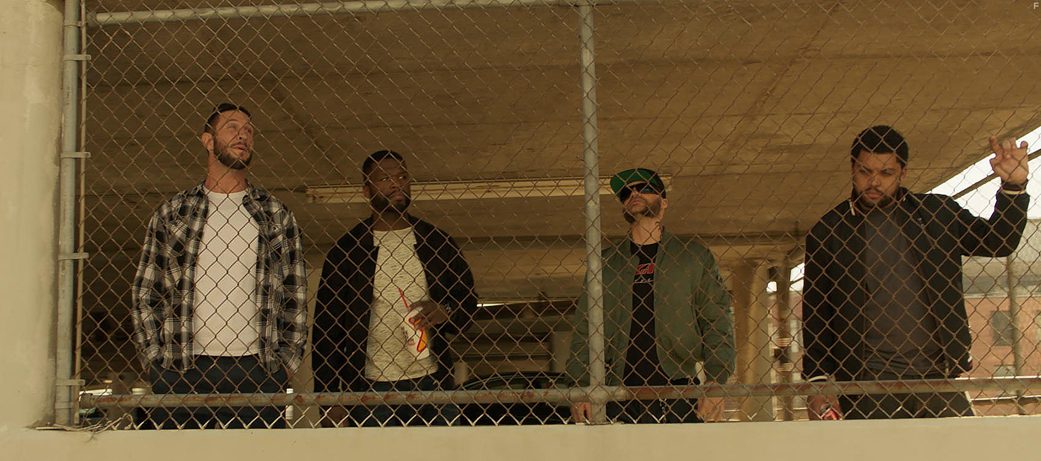 Evan Jones, Pablo Schreiber, and 50 Cent in Den of Thieves (2018)