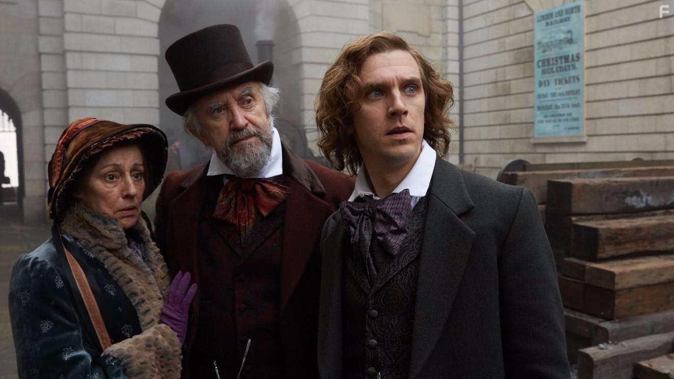 Jonathan Pryce, Ger Ryan, and Dan Stevens in The Man Who Invented Christmas (2017)