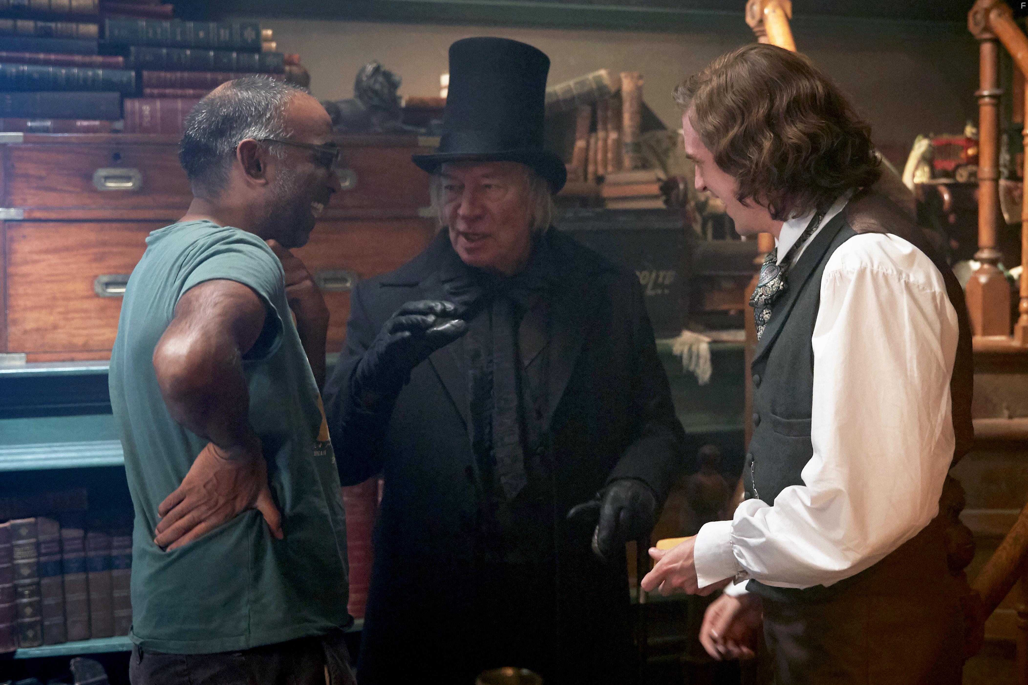 Christopher Plummer, Bharat Nalluri, and Dan Stevens in The Man Who Invented Christmas (2017)