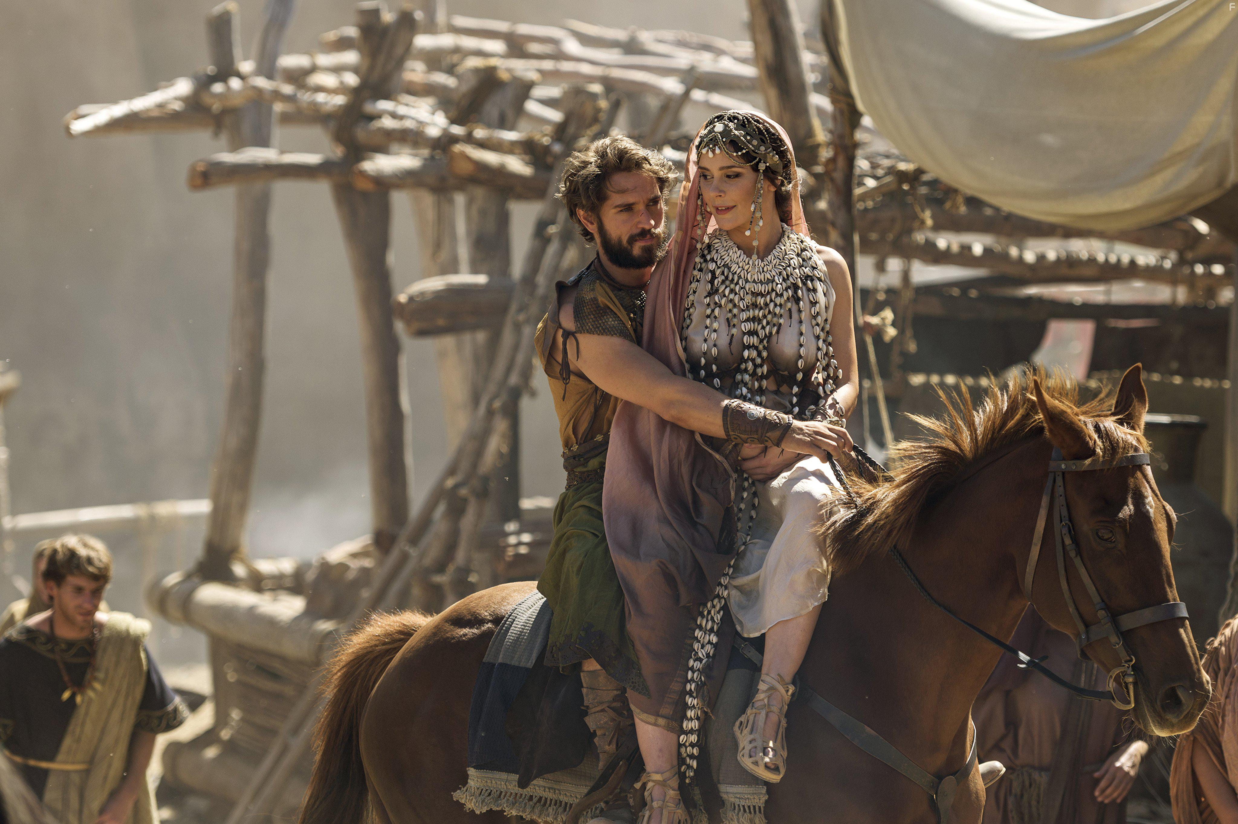 Louis Hunter and Bella Dayne in Troy: Fall of a City (2018)