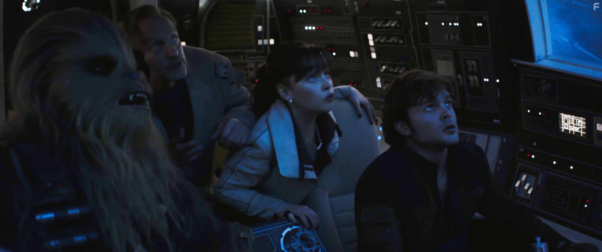 Woody Harrelson, Alden Ehrenreich, Emilia Clarke, and Joonas Suotamo in Solo: A Star Wars Story (2018)