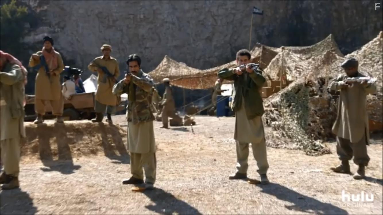 Tawfeek Barhom and Nebras Jamali in The Looming Tower (2018)