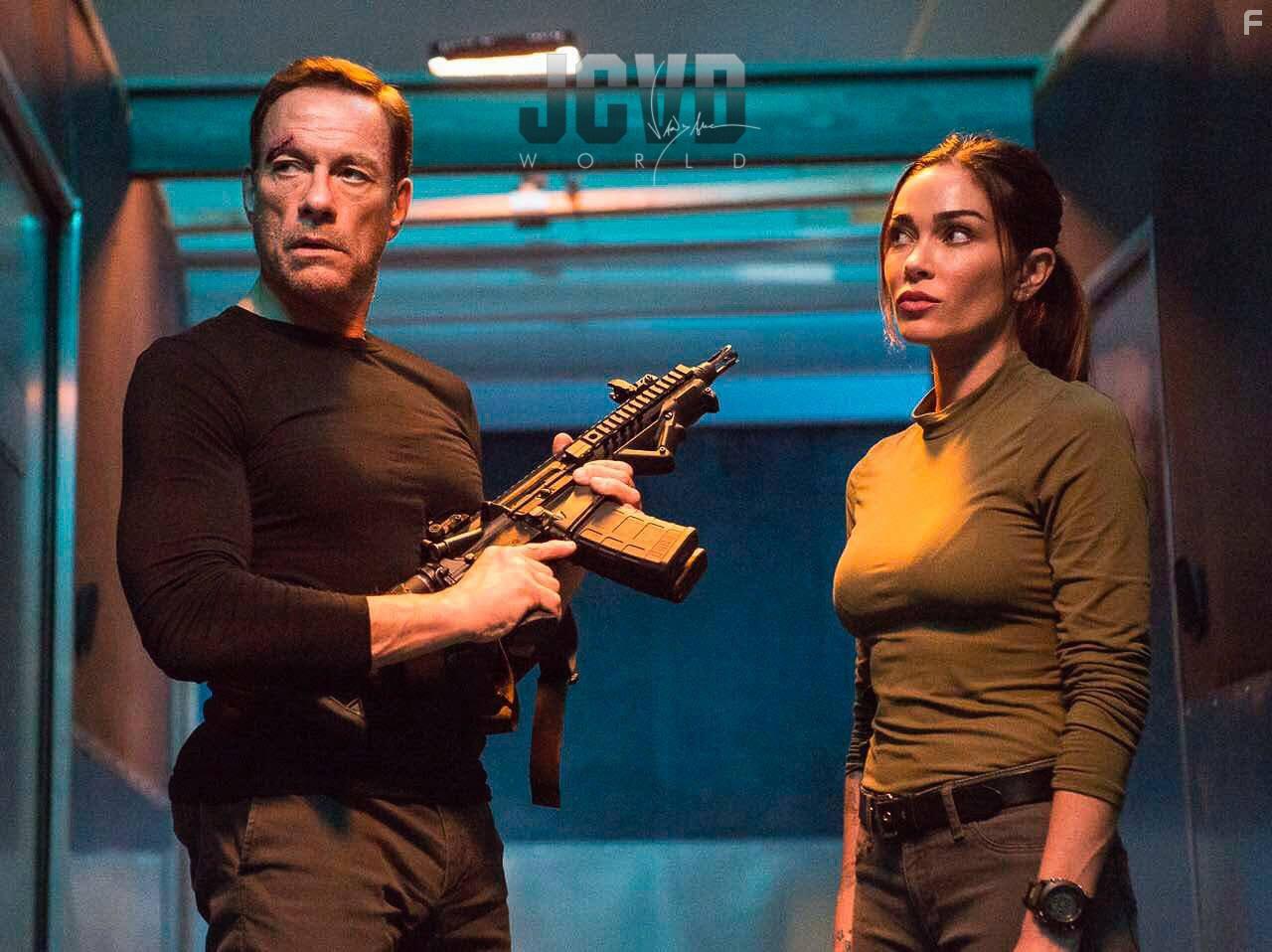 Jean-Claude Van Damme and Jasmine Waltz in Black Water (2018)