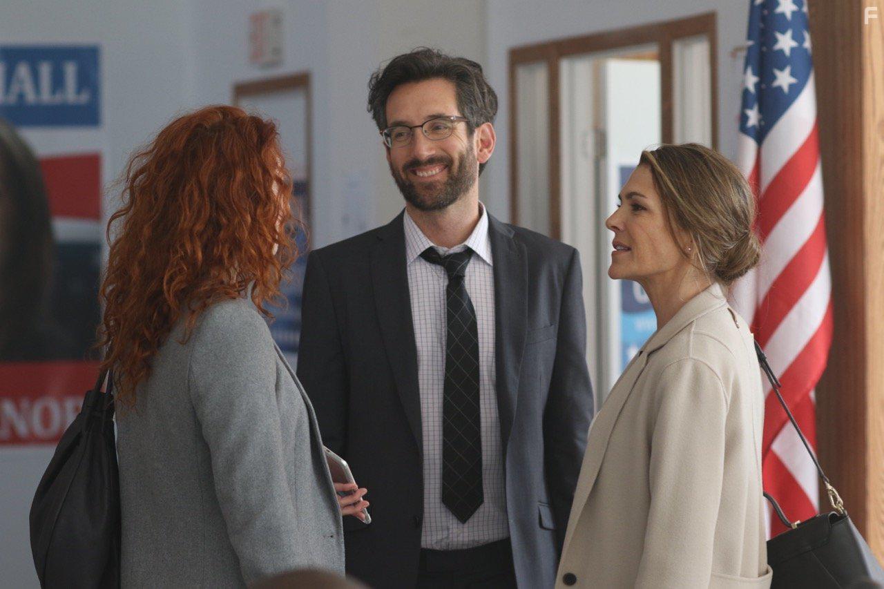 Paige Turco and Gord Rand in Separated at Birth (2018)