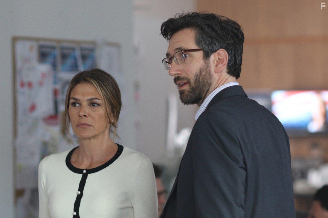 Paige Turco and Gord Rand in Separated at Birth (2018)