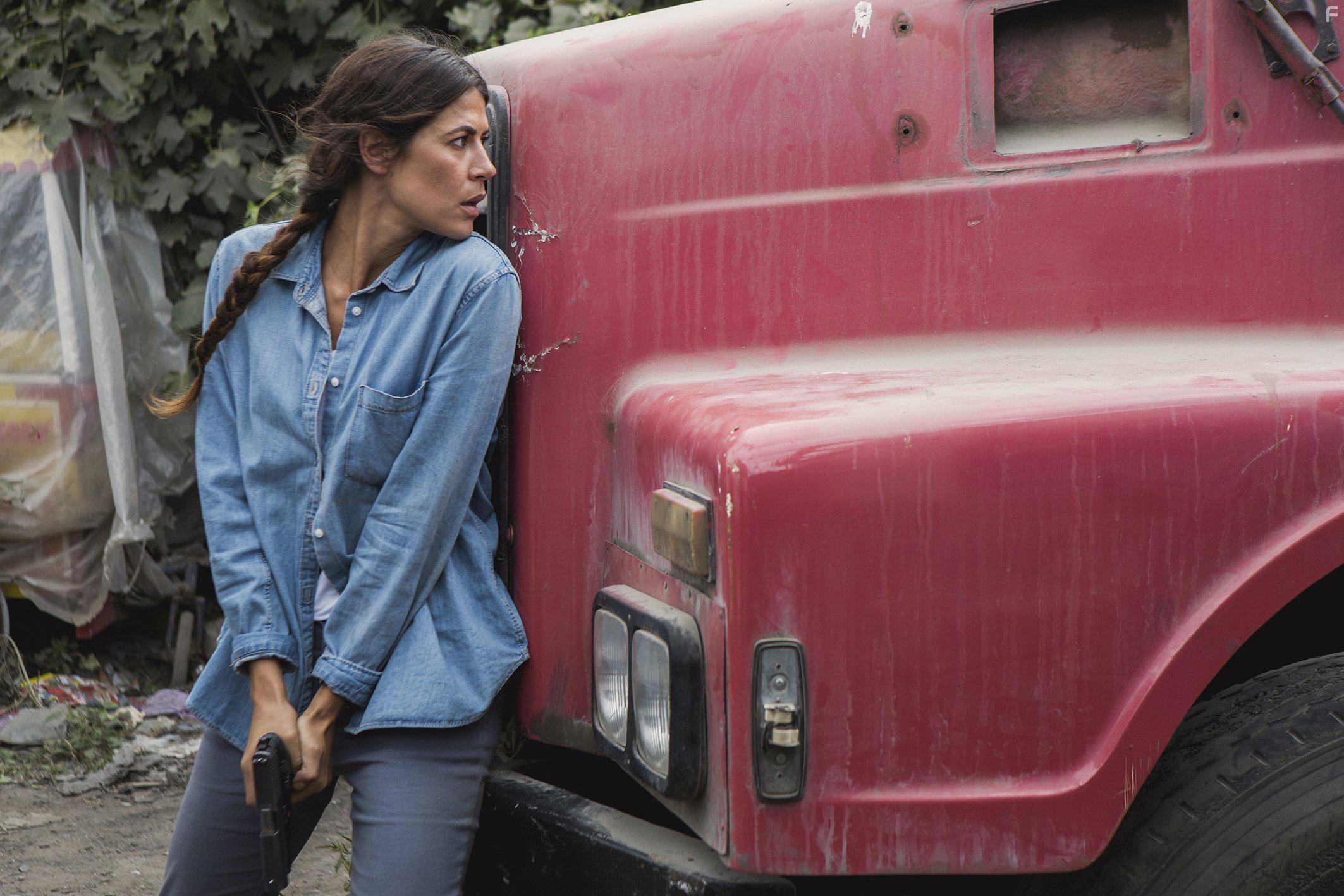 Karima McAdams in Deep State (2018)