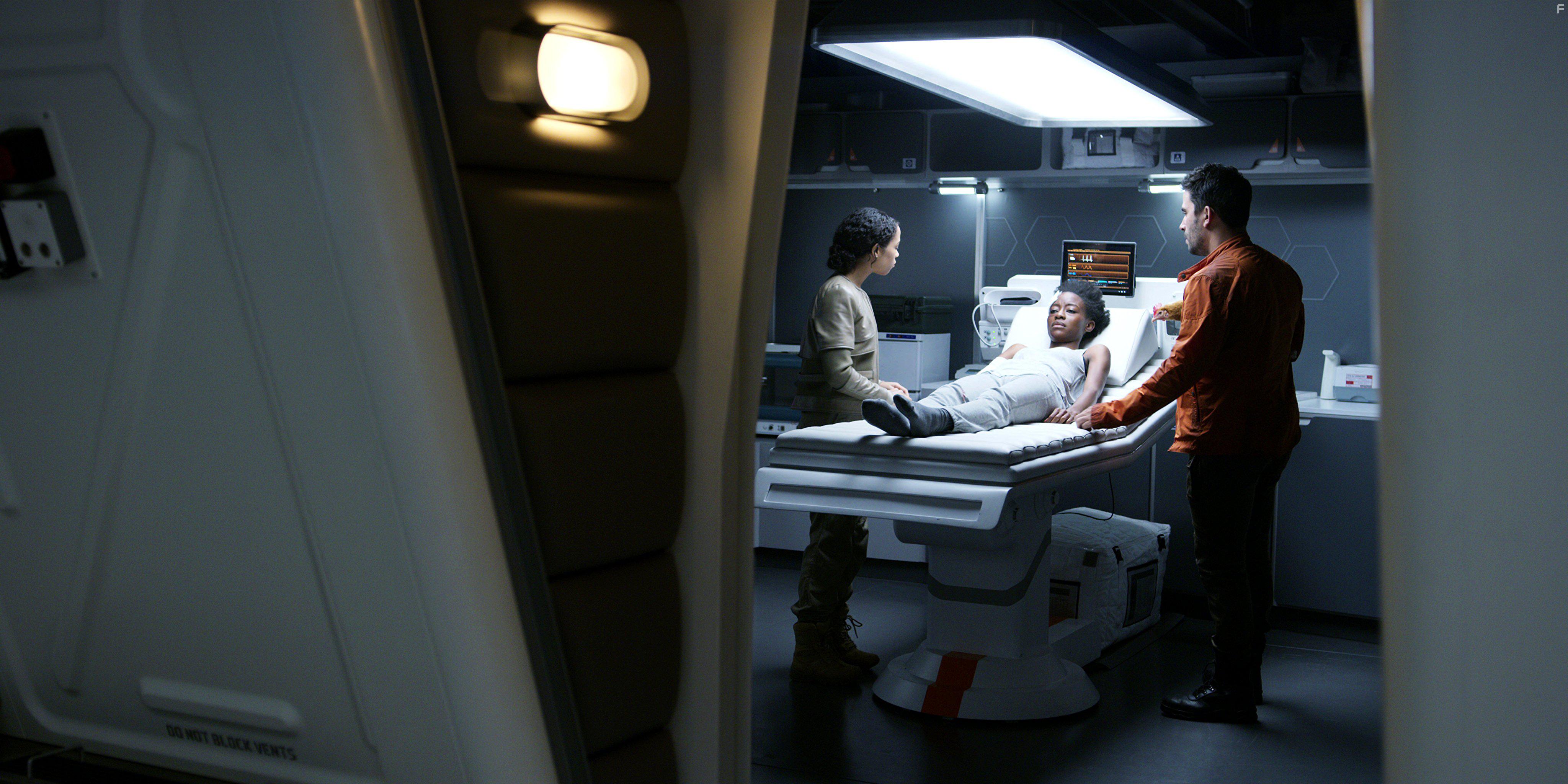 Ignacio Serricchio, Sibongile Mlambo, and Taylor Russell in Lost in Space (2018)