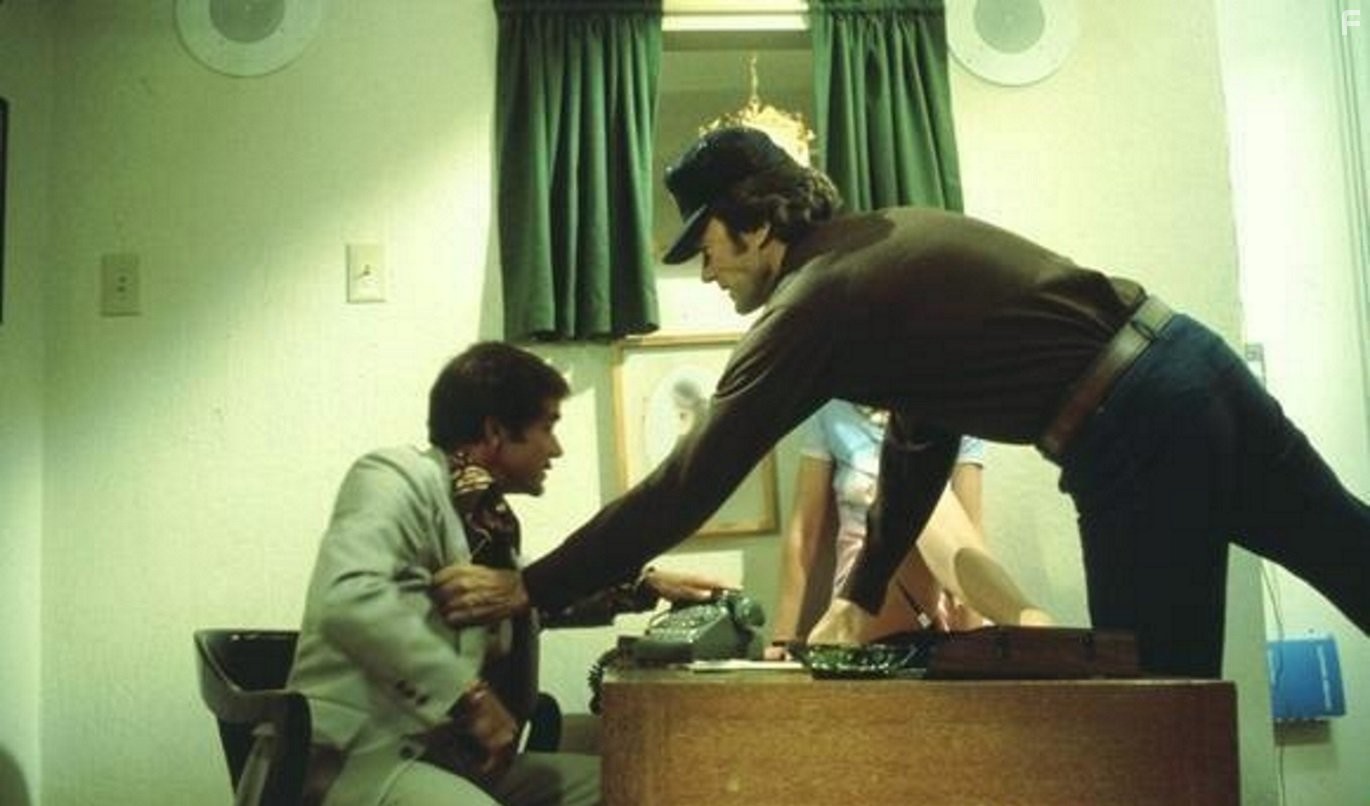 Clint Eastwood and Robert F. Hoy in Подкрепление (1976)