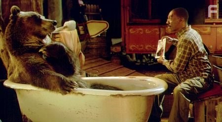 Eddie Murphy (as the good doctor) counsels Archie the bear