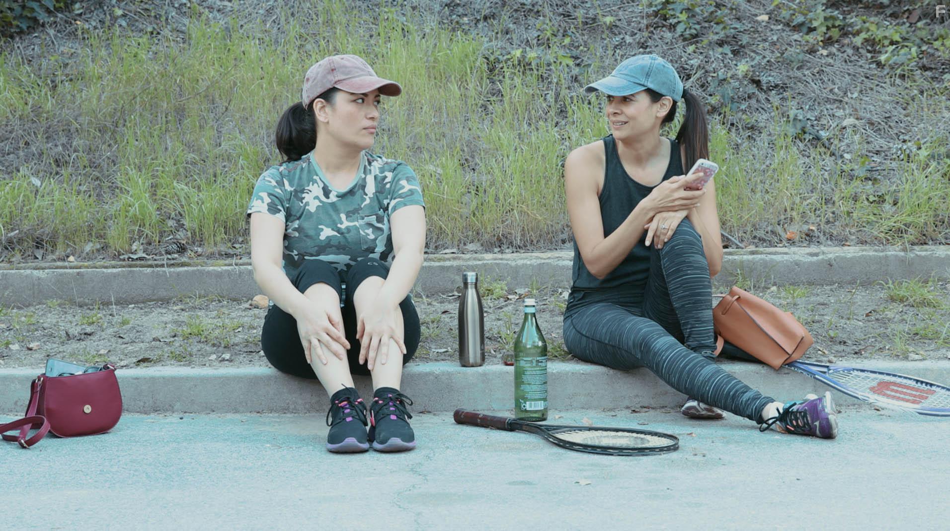 Melody Melendez and Michelle Thorn in Single AF (2018)