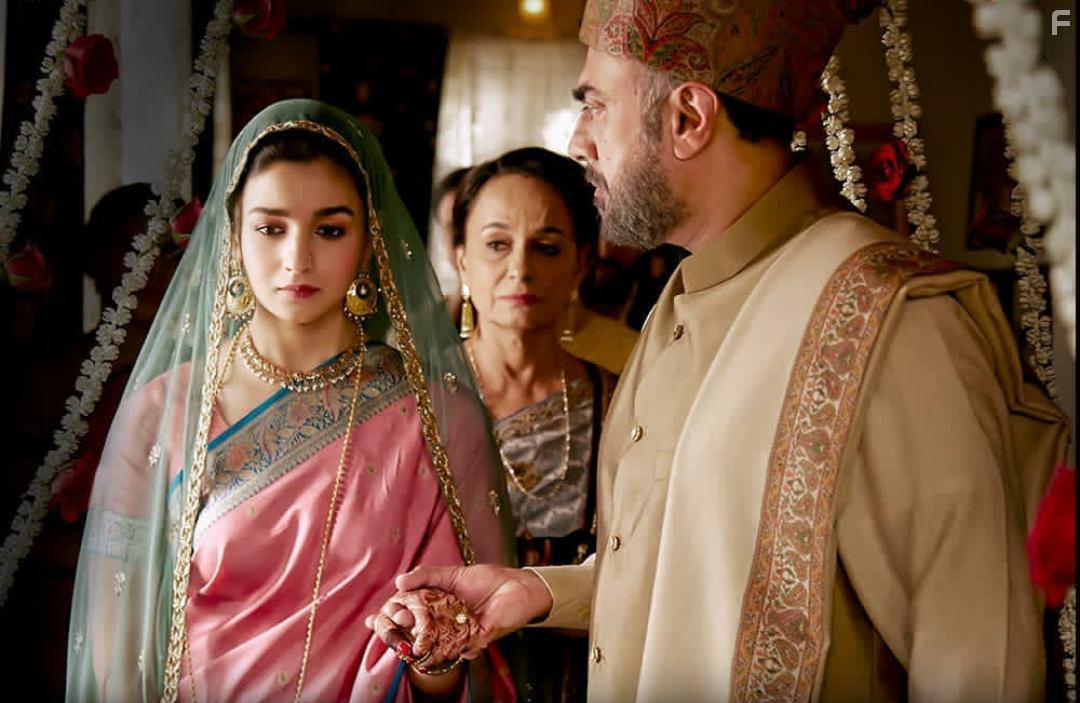 Rajit Kapoor and Alia Bhatt in Raazi (2018)