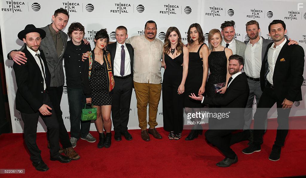 Director Robert Scott Wildes (3rd right rear) poses in a group photo with supporting cast members at the premiere of 'Poor Boy' Premiere during the 2016 Tribeca Film Festival at Chelsea Bow Tie Cinemas on April 17, 2016 in New York City