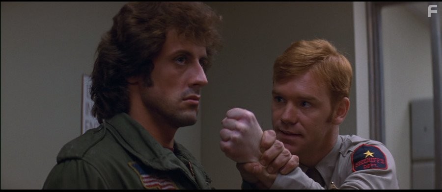 Sylvester Stallone and David Caruso in Первая кровь (1982)