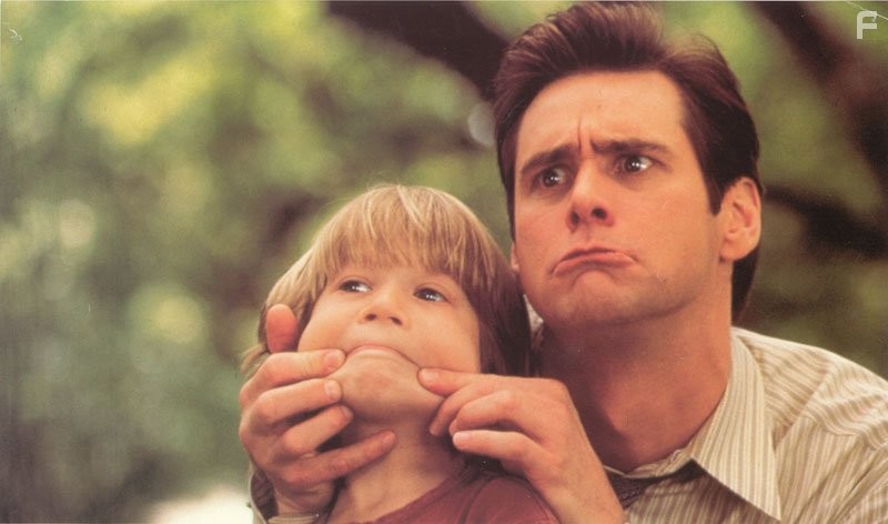 Jim Carrey and Justin Cooper in Лжец, лжец (1997)