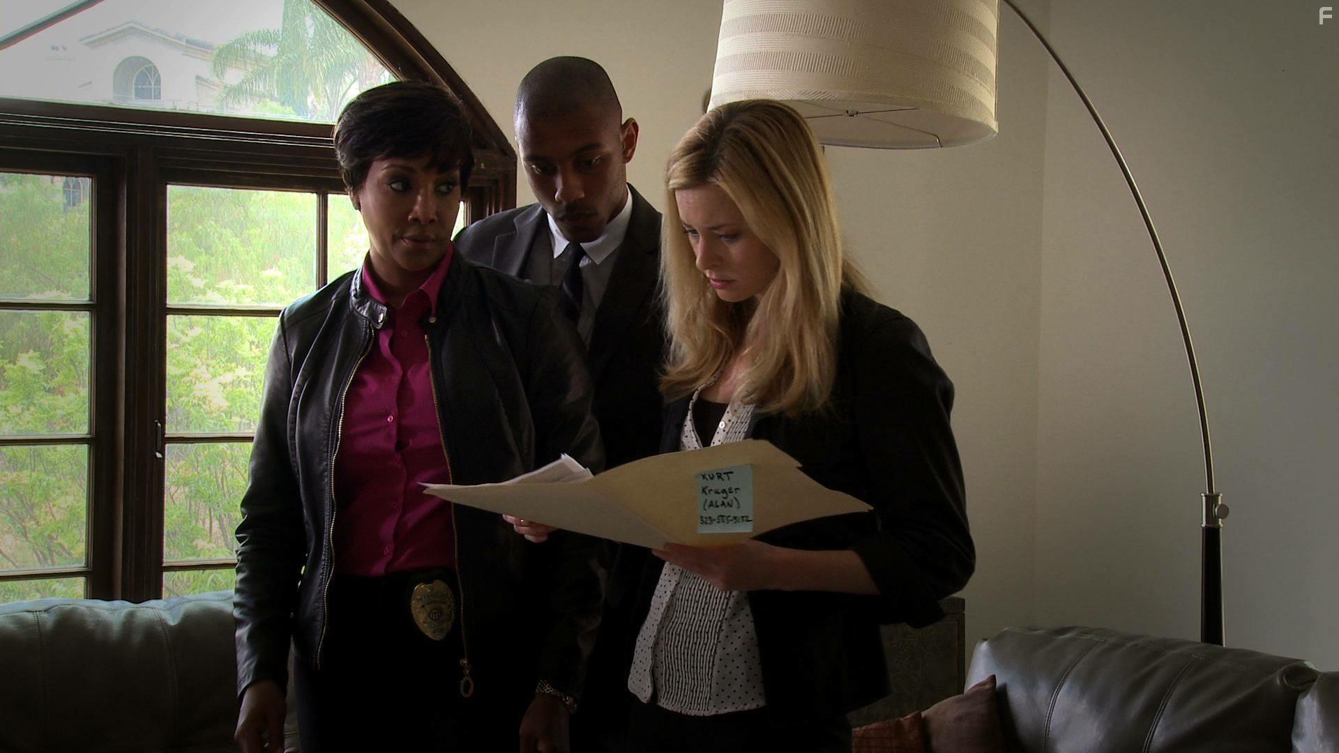 Vivica Fox, Jamel King, and Jessica Morris in Lifetime's "The Wrong Roommate"