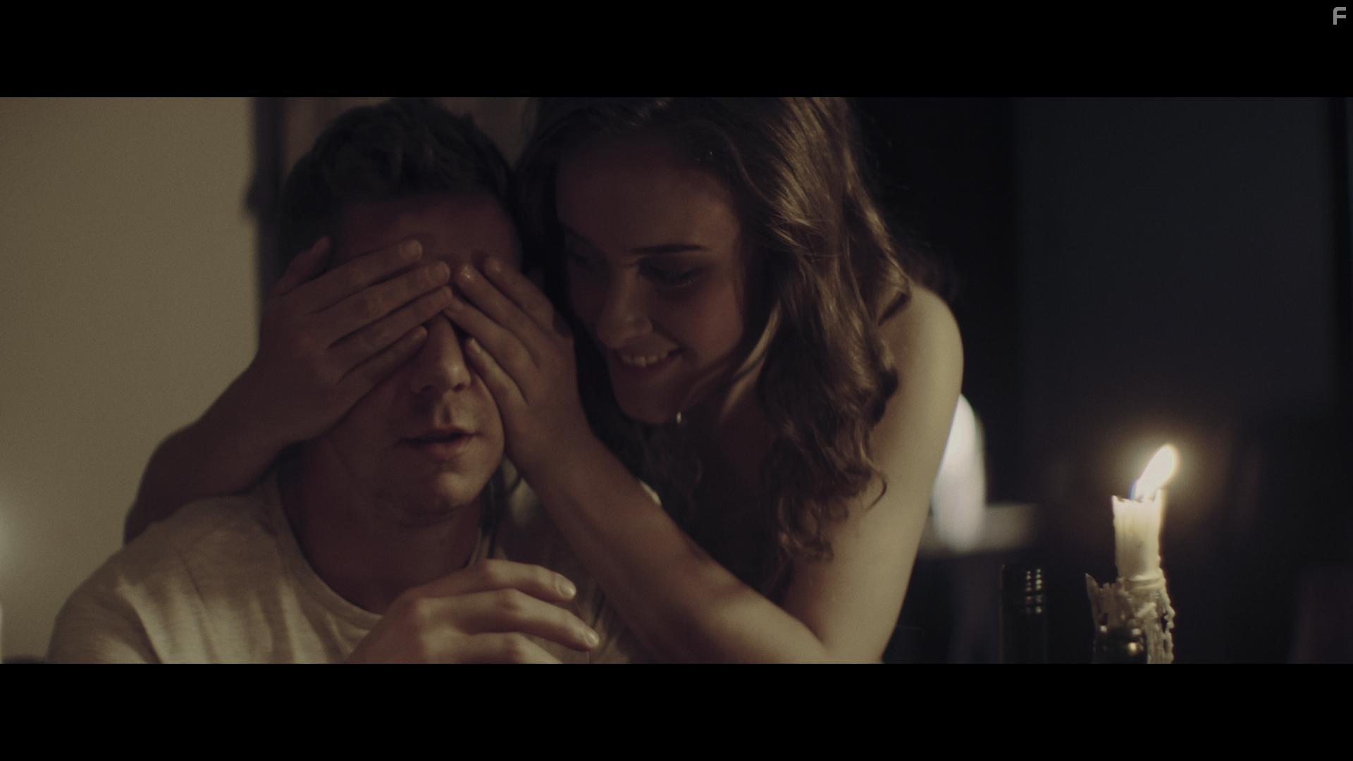 Karl Davies and April Pearson in Fractured (2018)