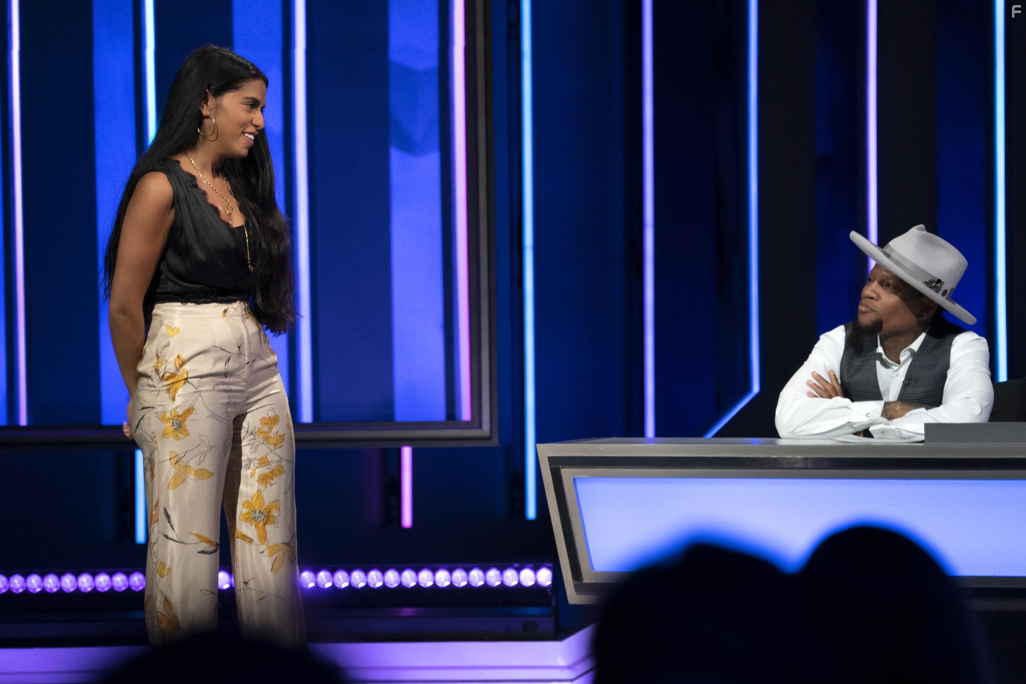 D.L. Hughley and Mona Chalabi in The Fix (2018)