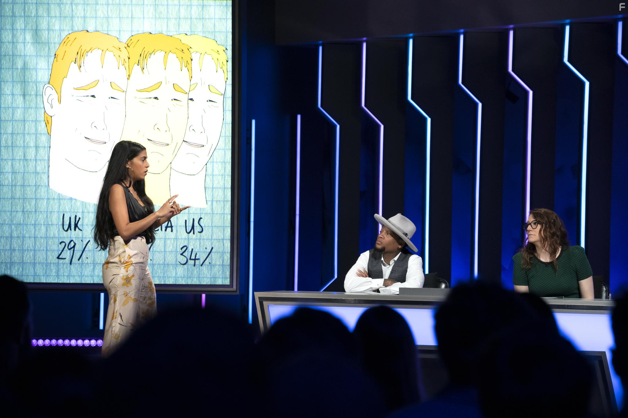 D.L. Hughley and Mona Chalabi in The Fix (2018)