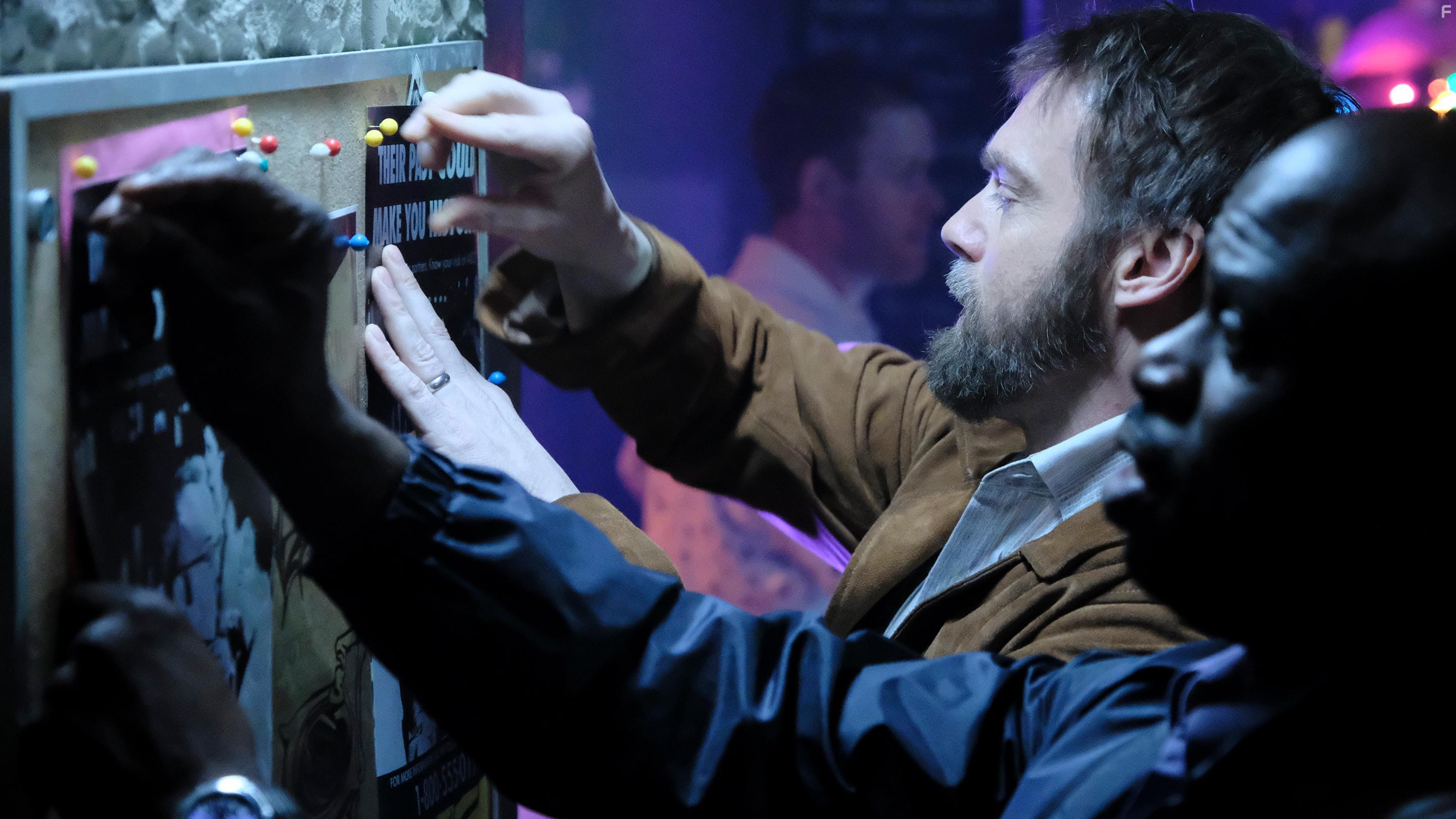 Michael Shanks and Garfield Wilson in Unspeakable (2019)