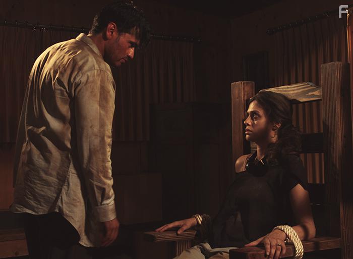 Miguel Angel Caballero and Markella Giannatou in Sleeping Dogs Lie (2018)