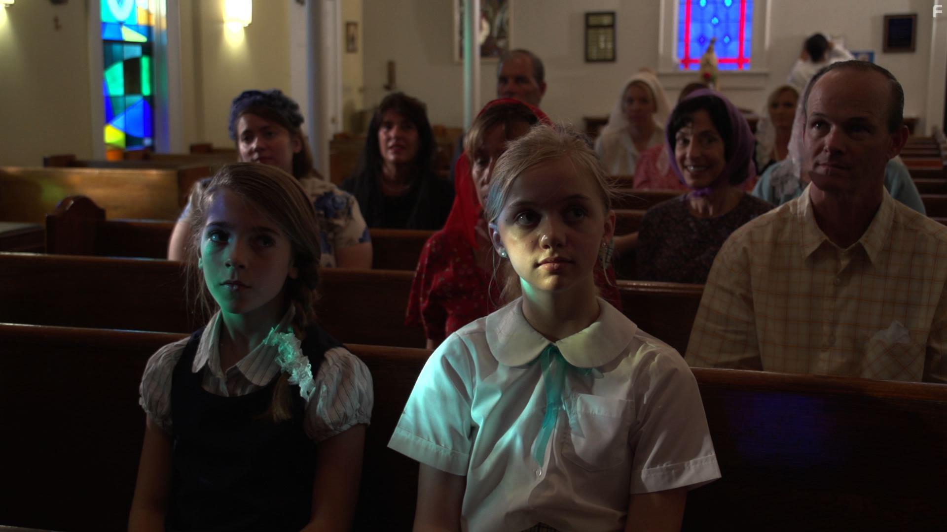 Maddie Nichols in Happy Log. St. Theresa's Catholic Church