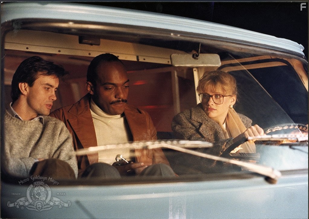 Jeffrey Combs, Barbara Crampton, and Ken Foree in Извне (1986)