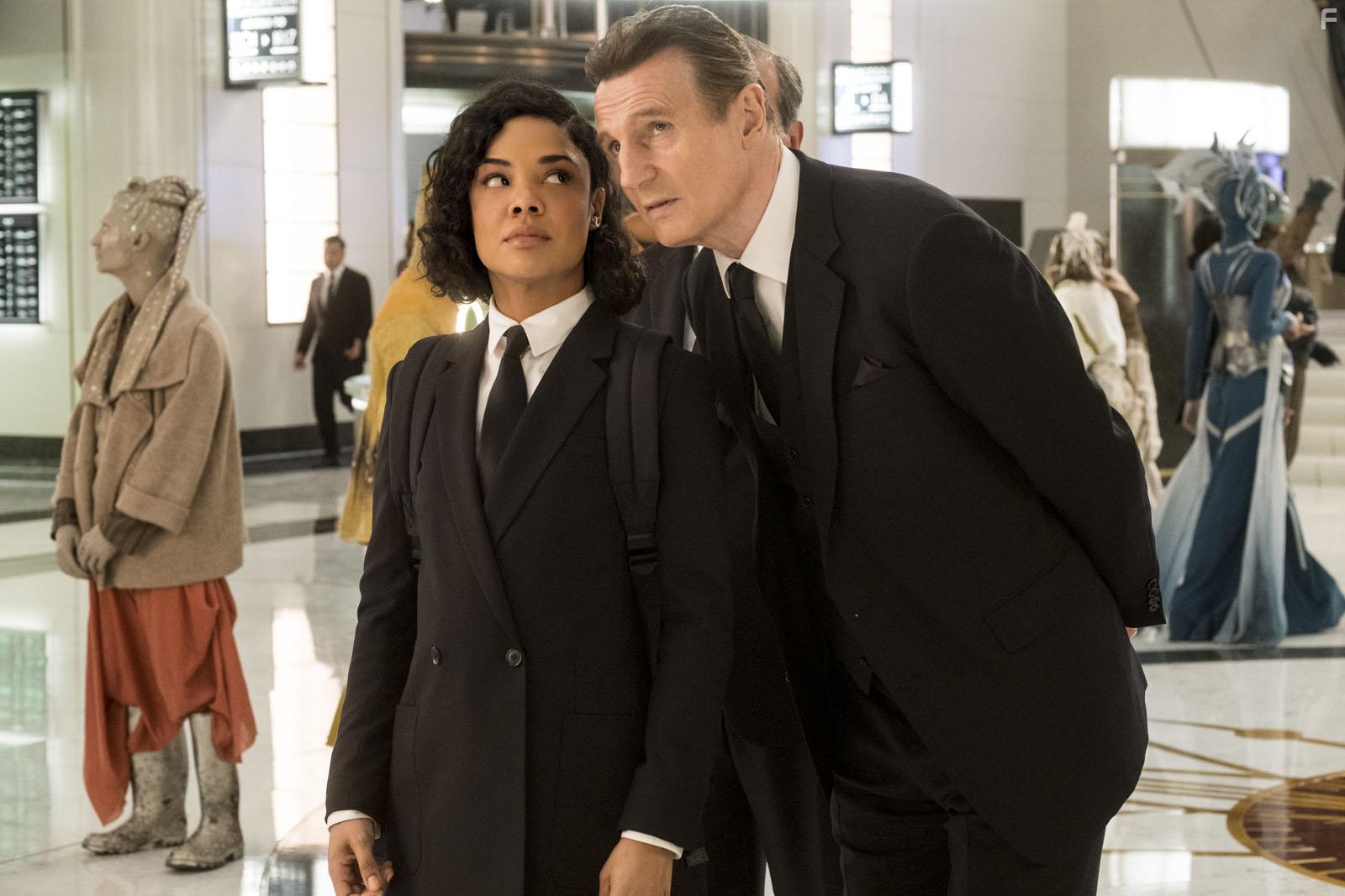 Liam Neeson and Tessa Thompson in Men in Black: International (2019)