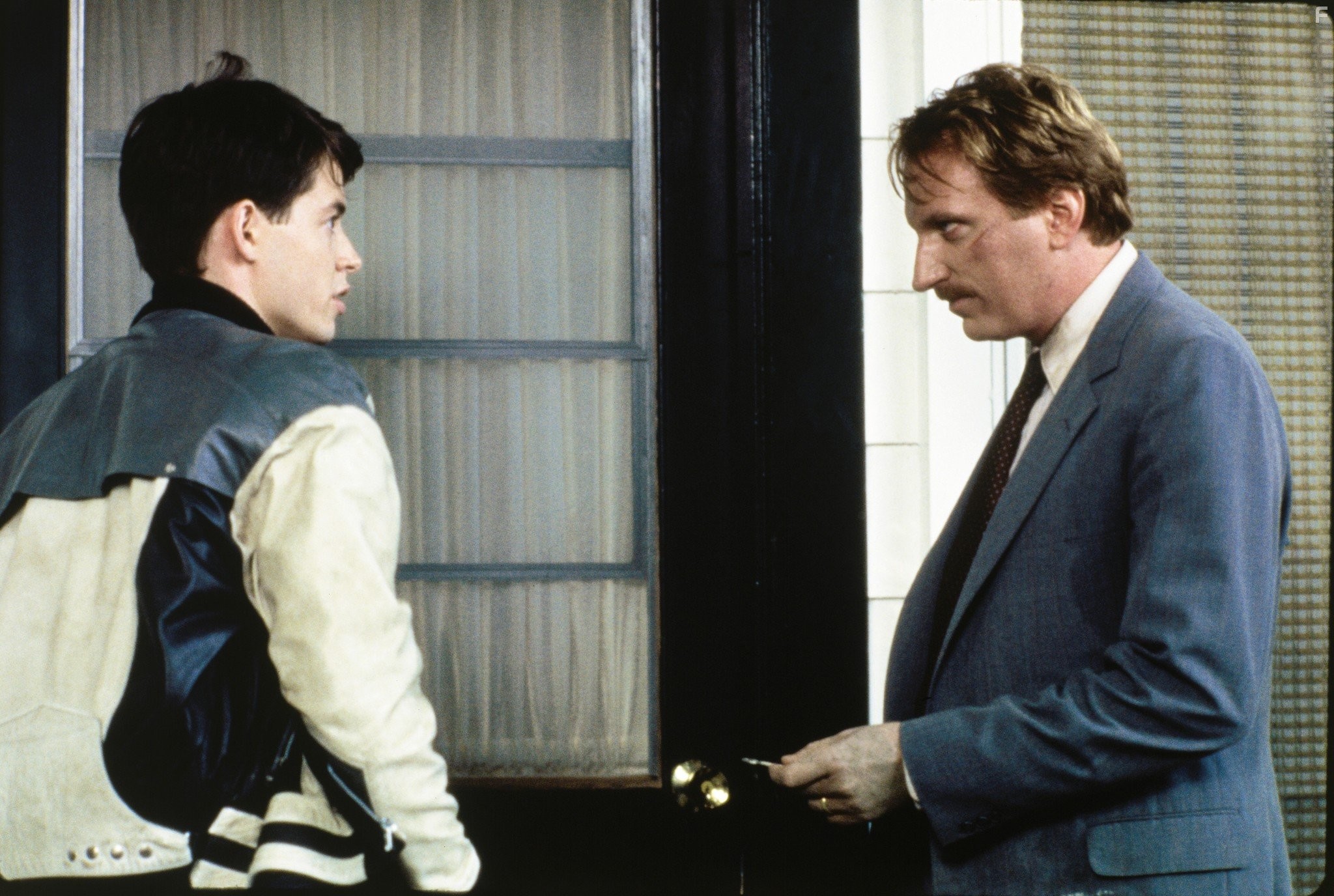 Matthew Broderick and Jeffrey Jones in Выходной день Ферриса Бьюллера (1986)