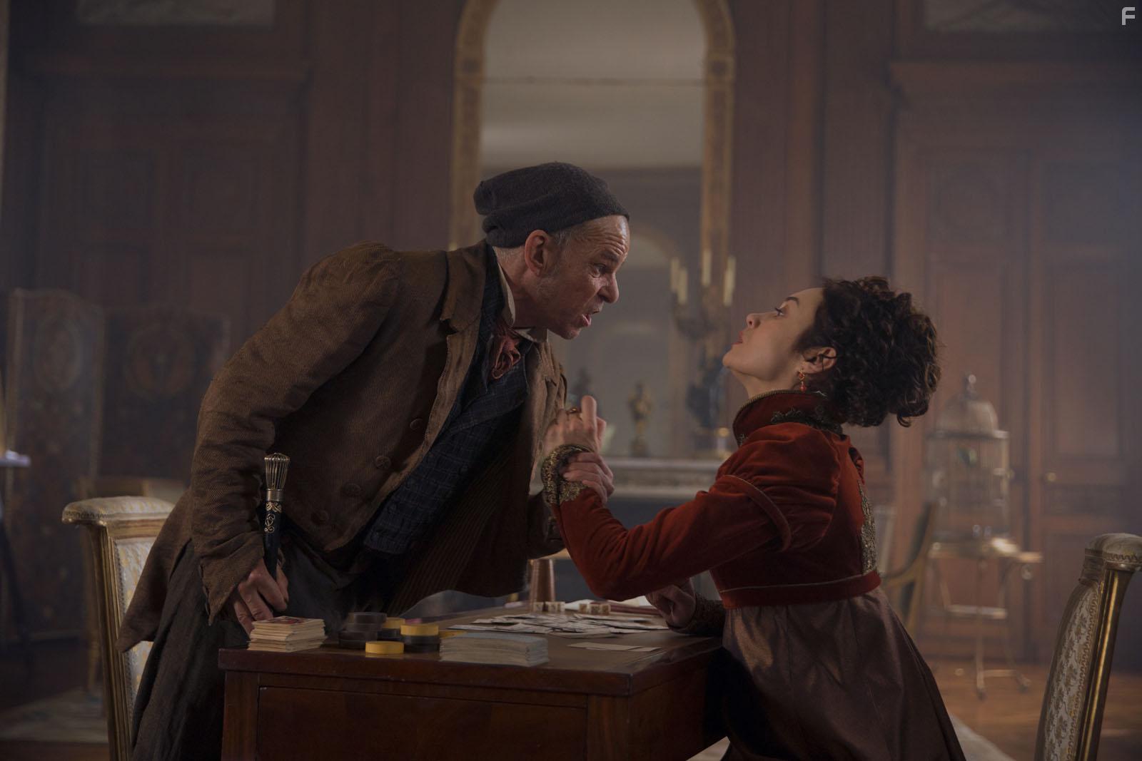 Denis Lavant and Olga Kurylenko in L'Empereur de Paris (2018)