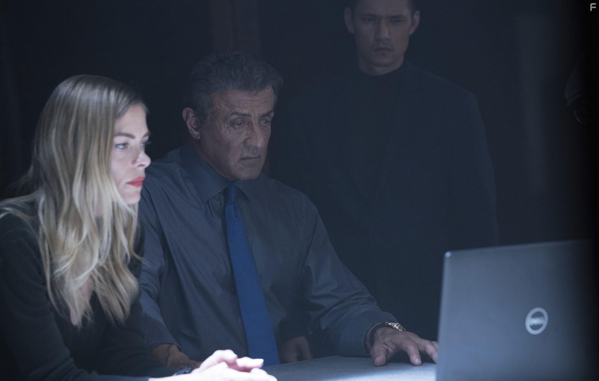 Sylvester Stallone, Jaime King, and Harry Shum Jr. in Escape Plan: The Extractors (2019)