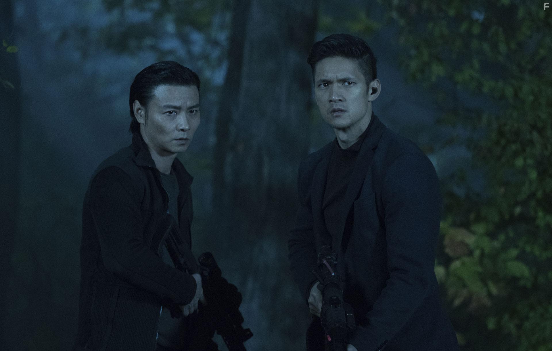 Jin Zhang and Harry Shum Jr. in Escape Plan: The Extractors (2019)