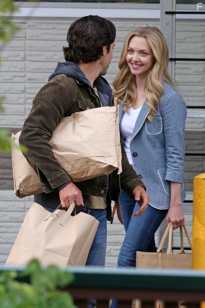 Milo Ventimiglia and Amanda Seyfried in The Art of Racing in the Rain (2019)