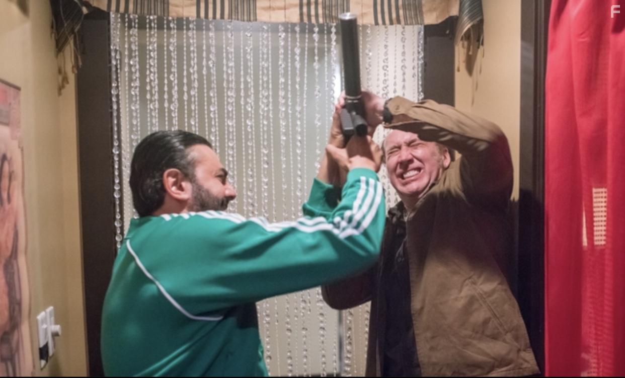 Nicolas Cage and Mohamed Karim in A Score to Settle (2019)