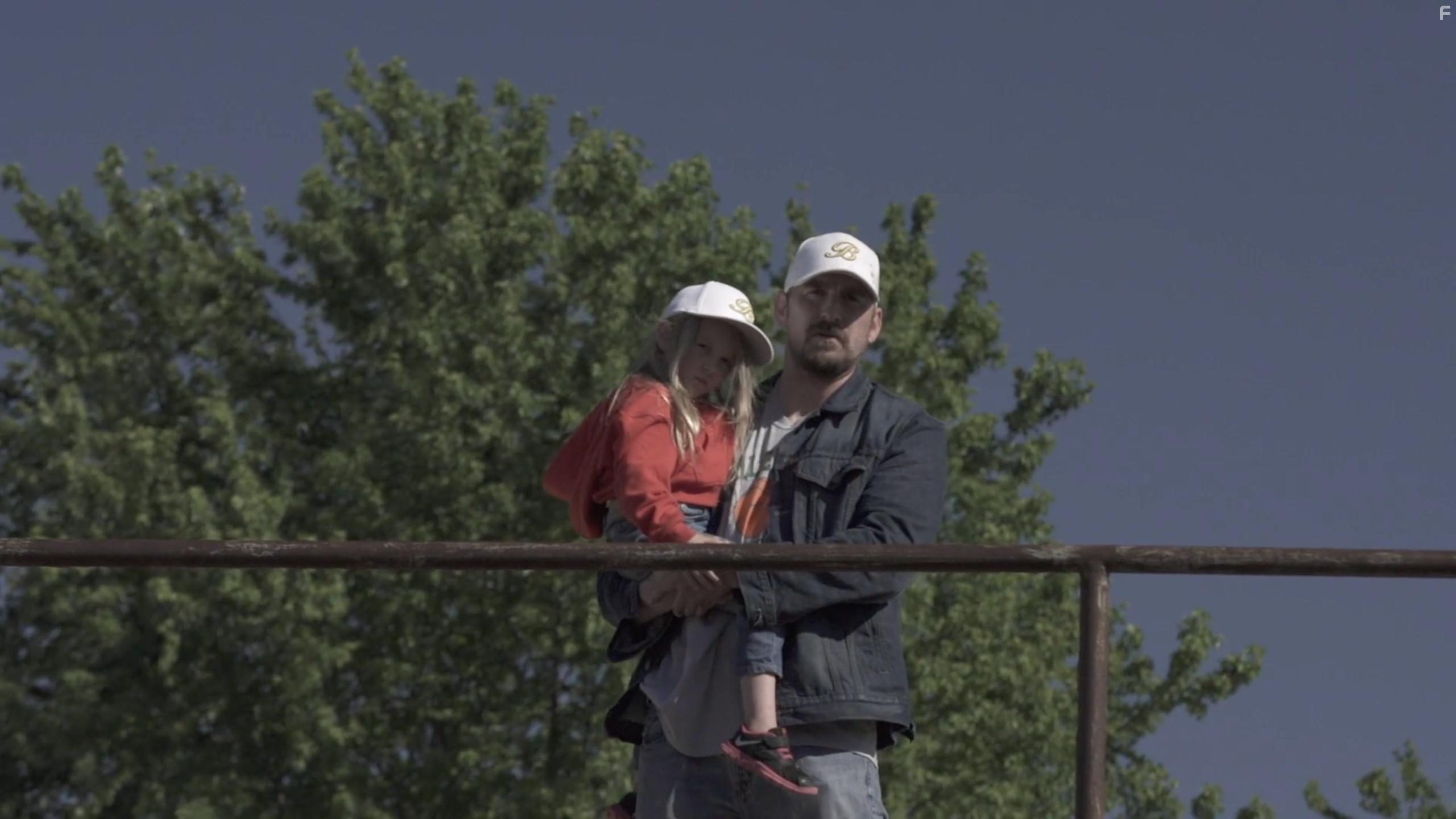 Adam Hampton and Scout Hampton in The Harvesters (2017)