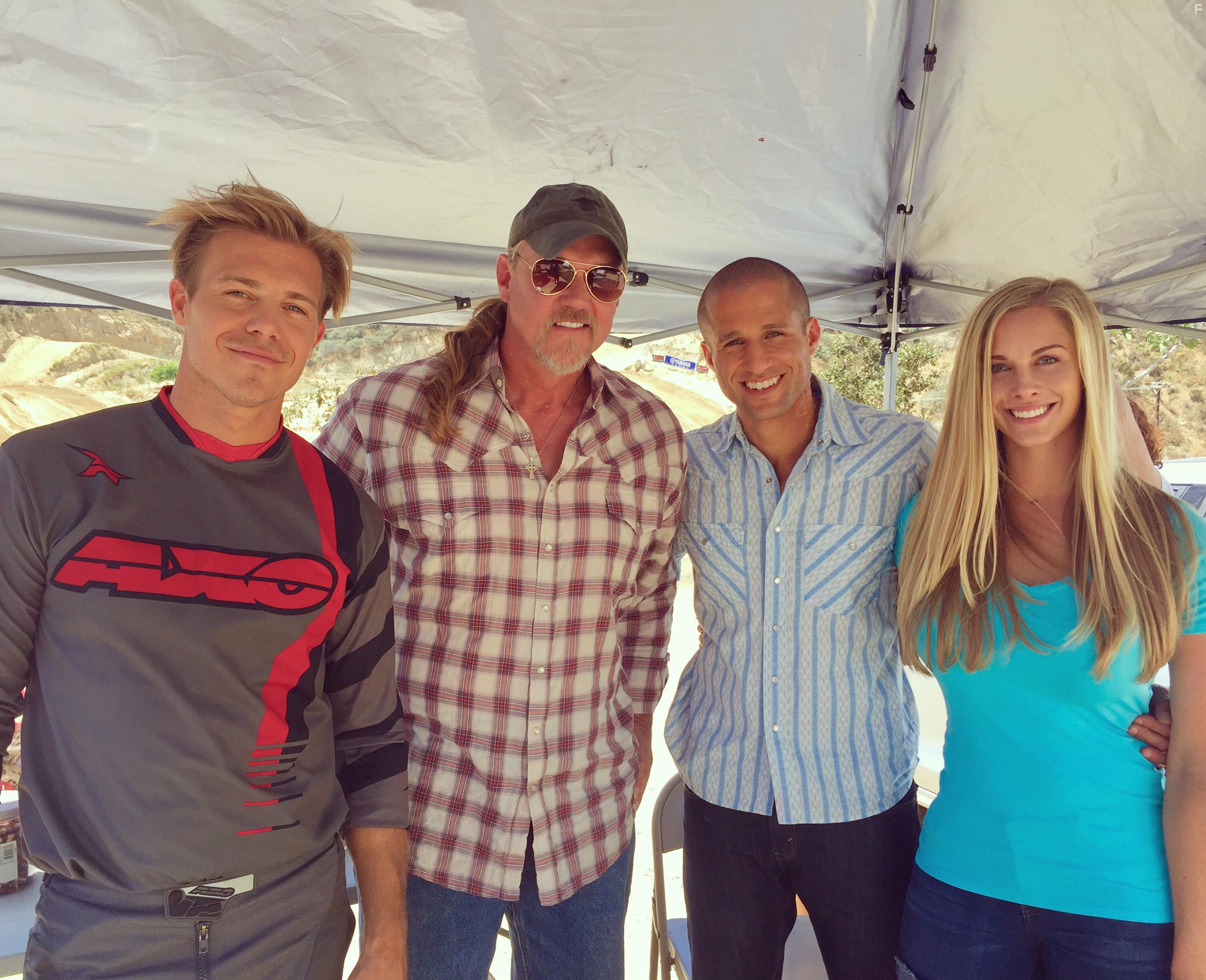 Michael Roark, Trace Adkins, Michael King, and Taylor Kalupa on the set of Motocross(2017).