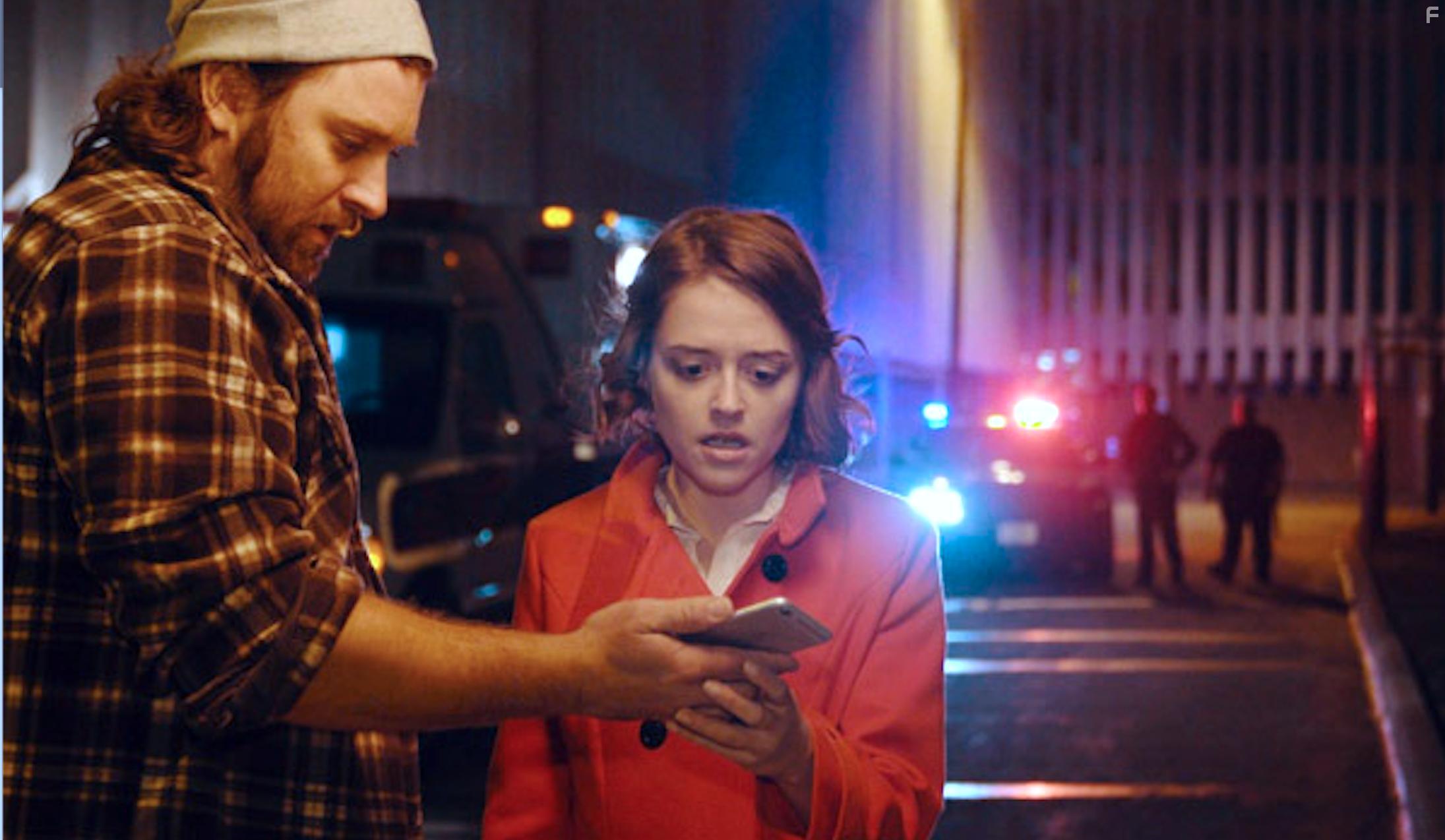 Lauren Ashley Carter and Adam Krause in Gags The Clown (2018)