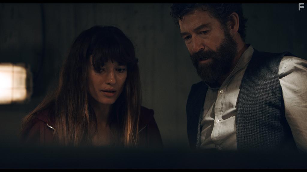 Steven Brand and Andrea Tivadar in Safe Inside (2019)