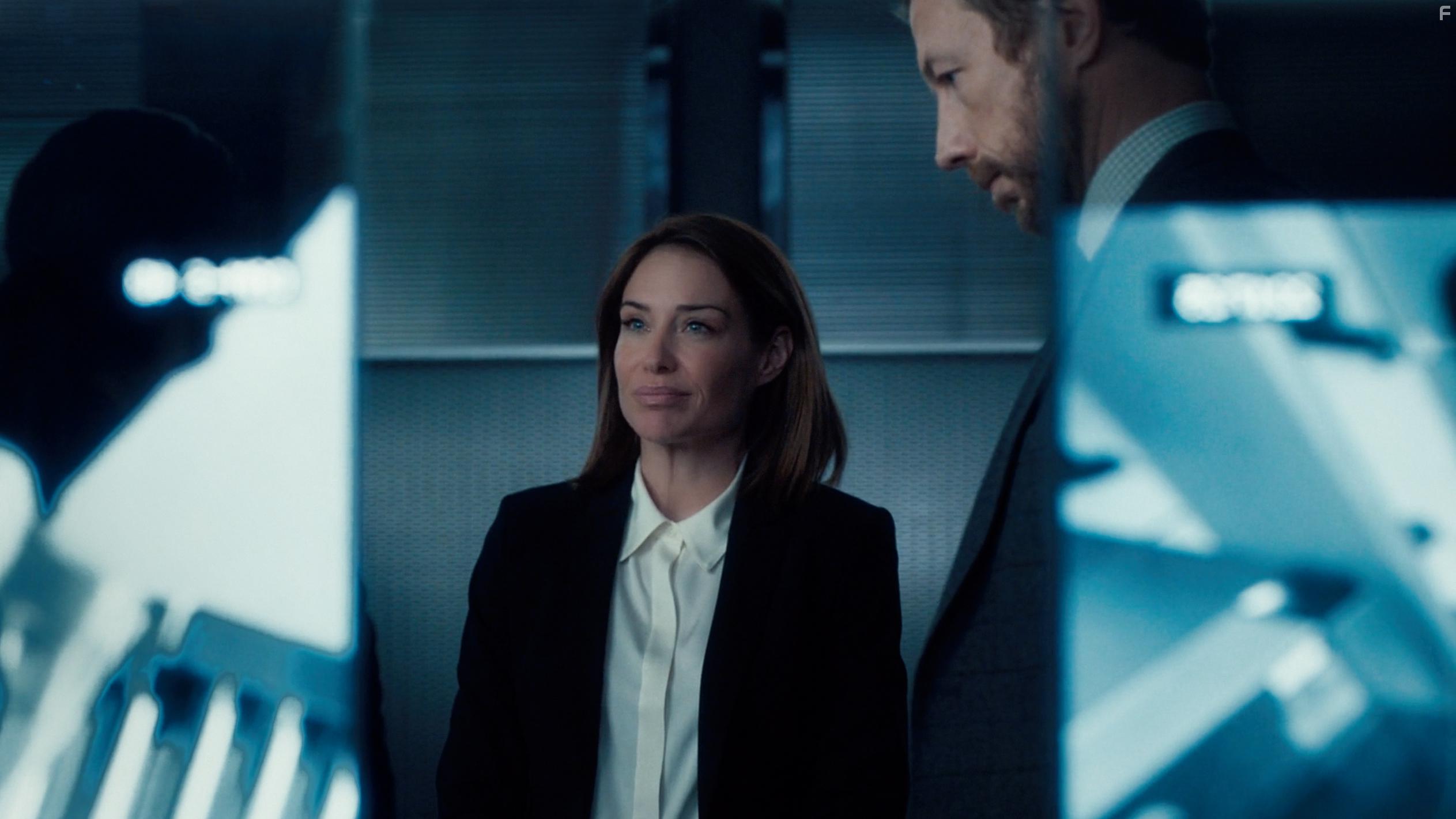 Claire Forlani and Kris Holden-Ried in Departure (2019)