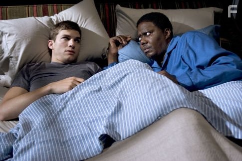Ashton Kutcher (l) and Bernie Mac star in Columbia Pictures/Regency Enterprises' new comedy Guess Who.