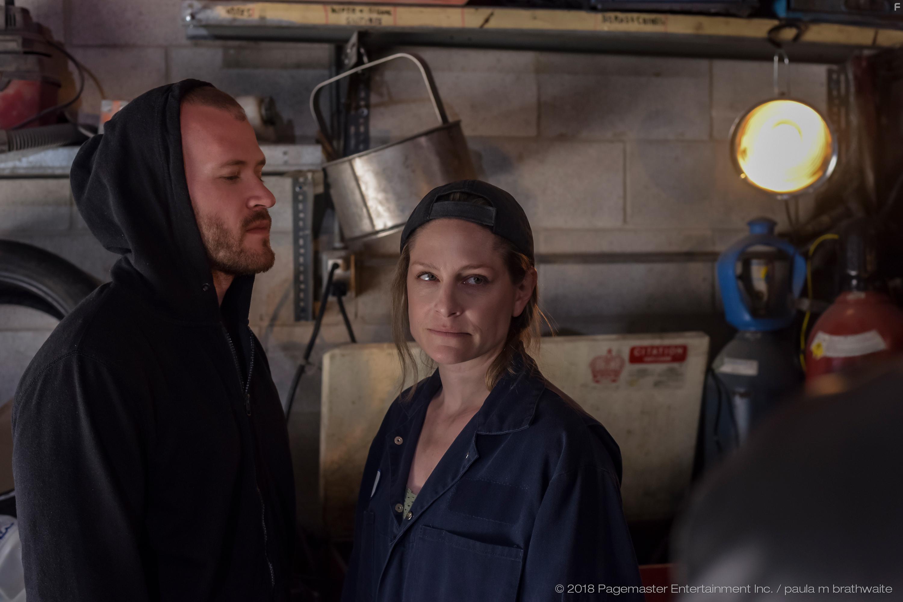 Jonathan Koensgen and Tara Spencer-Nairn in Robbery (2018)