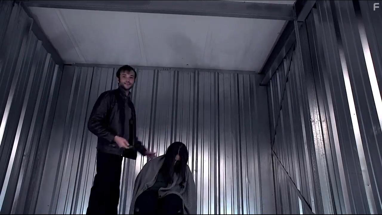 Caitlin Drance and Chris Dettone in Confined (2019)