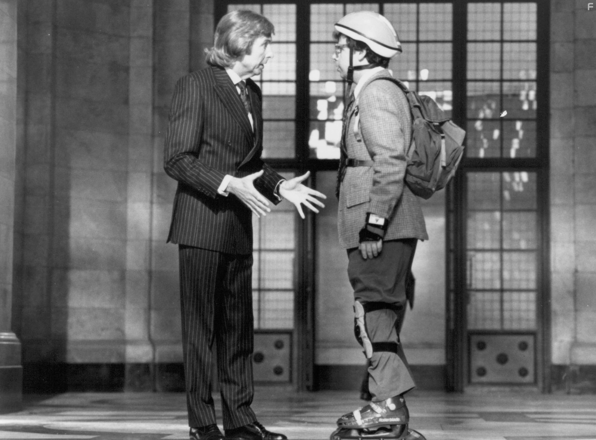 Eric Idle and Rick Moranis in Перепутанные наследники (1993)